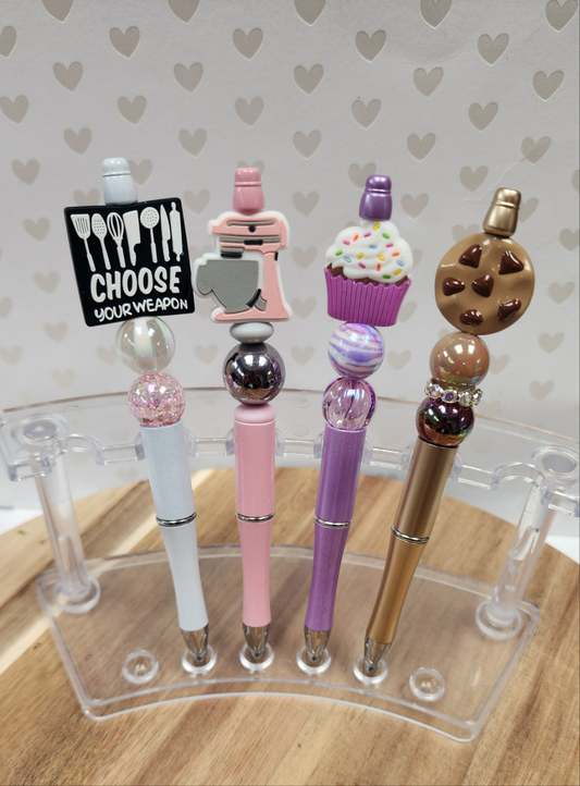 Baking Make Your Own Beaded pen kit includes 4 focal focal beads - choose your weapon, cupcake, mixer and cookie. An easy way to nurture your crafty side. Everything you need to complete your project start to finish! 